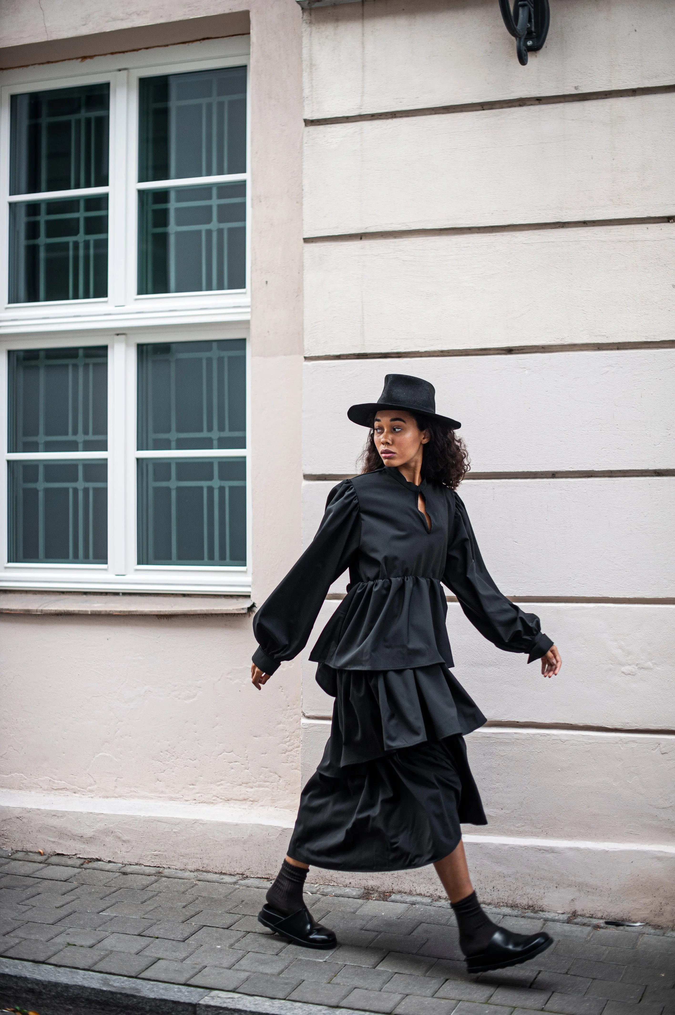 Black maxi wool dress with puff sleeves and ruffles