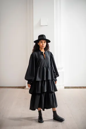 Black maxi wool dress with puff sleeves and ruffles